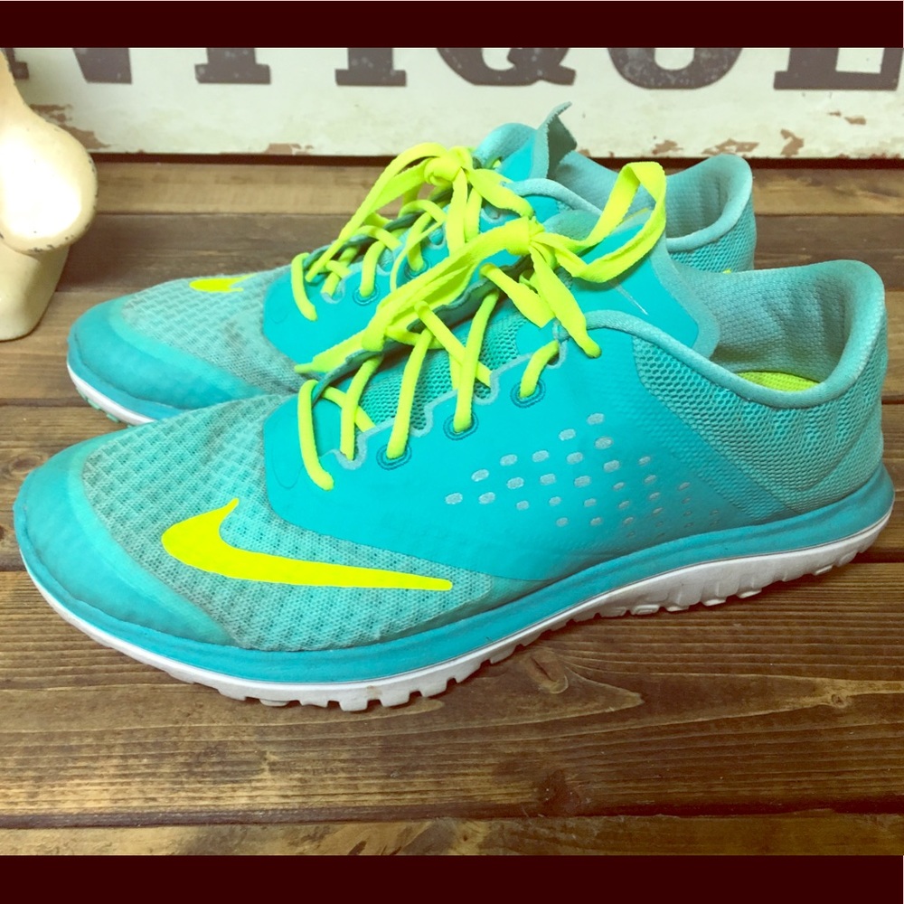 Size 7.5 turquoise Nikes.
